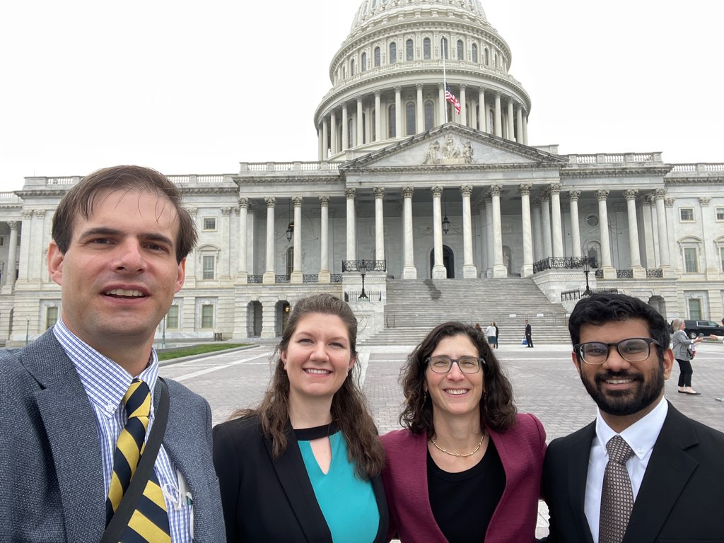 A picture of Yaswant and three other standing in front of the US Capitol Building during a visit to Congress.